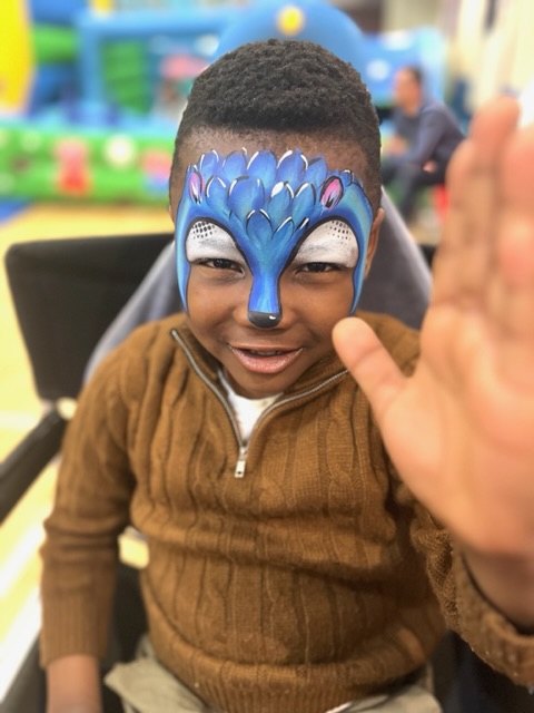 boy with sonic the hedgehog face paint in Telford